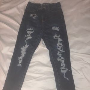 high rise dark blue denim jeans.